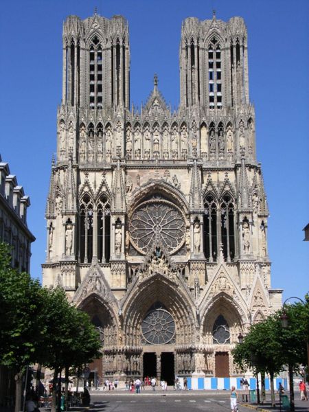 Reims Cathedral in Reims, France is a good example of French Gothic incorporating the rose window (located in the center of the cathedral). (Source)
