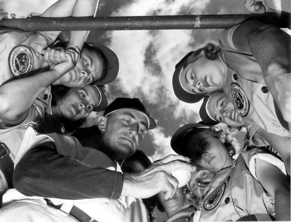 Dick Bass gives members of Fort Wayne club pointers on new 10-3/8" ball which will be used this year, April 22, 1948. Photo Credit: Florida Memory