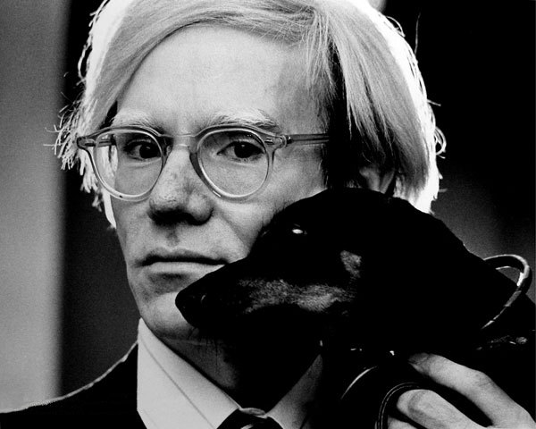 Andy Warhol, with Archie, by Jack Mitchell, 1973. (Source)