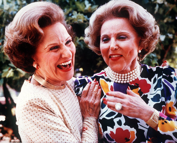 Pauline Phillips, left, who wrote an advice column as Dear Abby, with her twin sister, Eppie Lederer, who wrote a column as Ann Landers, in 1986 at their 50th high school reunion. Photo Credit: John Gaps III/Associate Press/New York Times