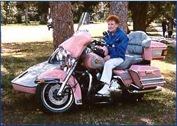 Dot on her pink Harley-Davidson bike