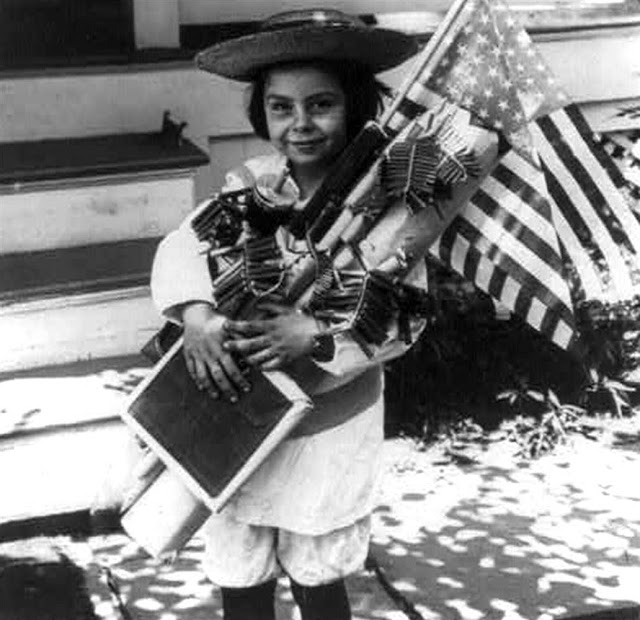 Child-with-fireworks-and-a-flag.jpg