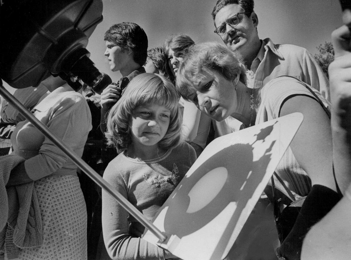 Watching a partial solar eclipse in Denver, 1977